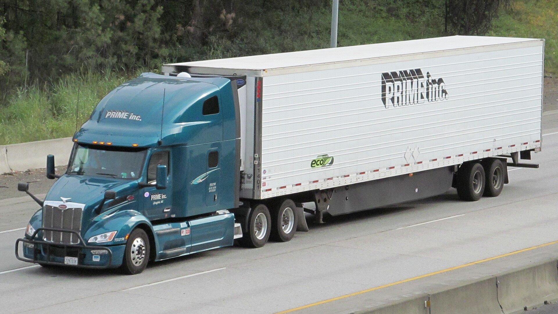 Yellow school bus front view showing driver door and windshield where alcohol interlock system would be installed