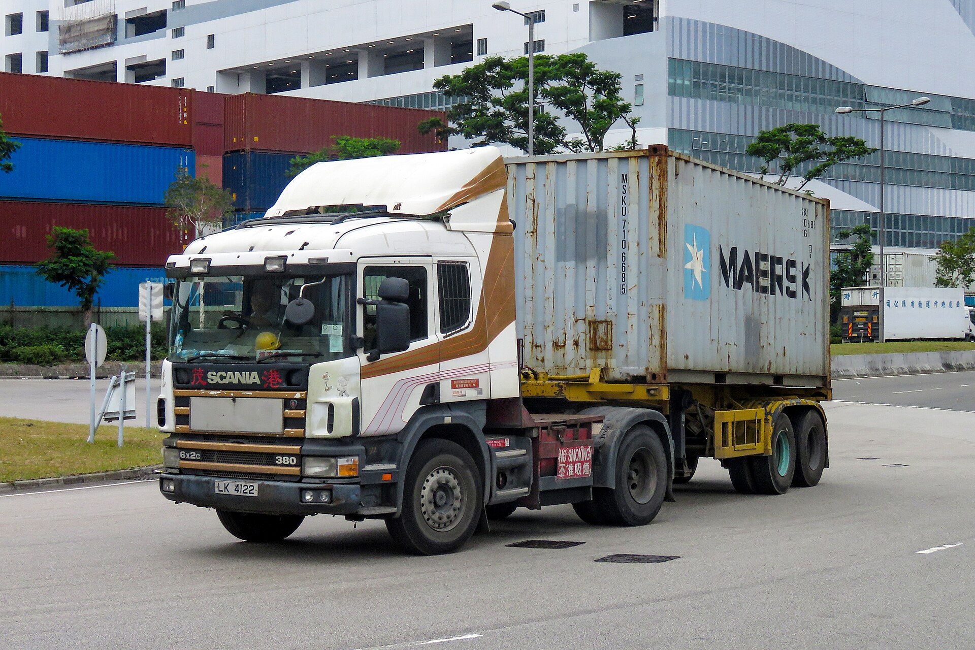 Schneider National semi-truck on highway, representing carrier acquisition strategy and truckload consolidation