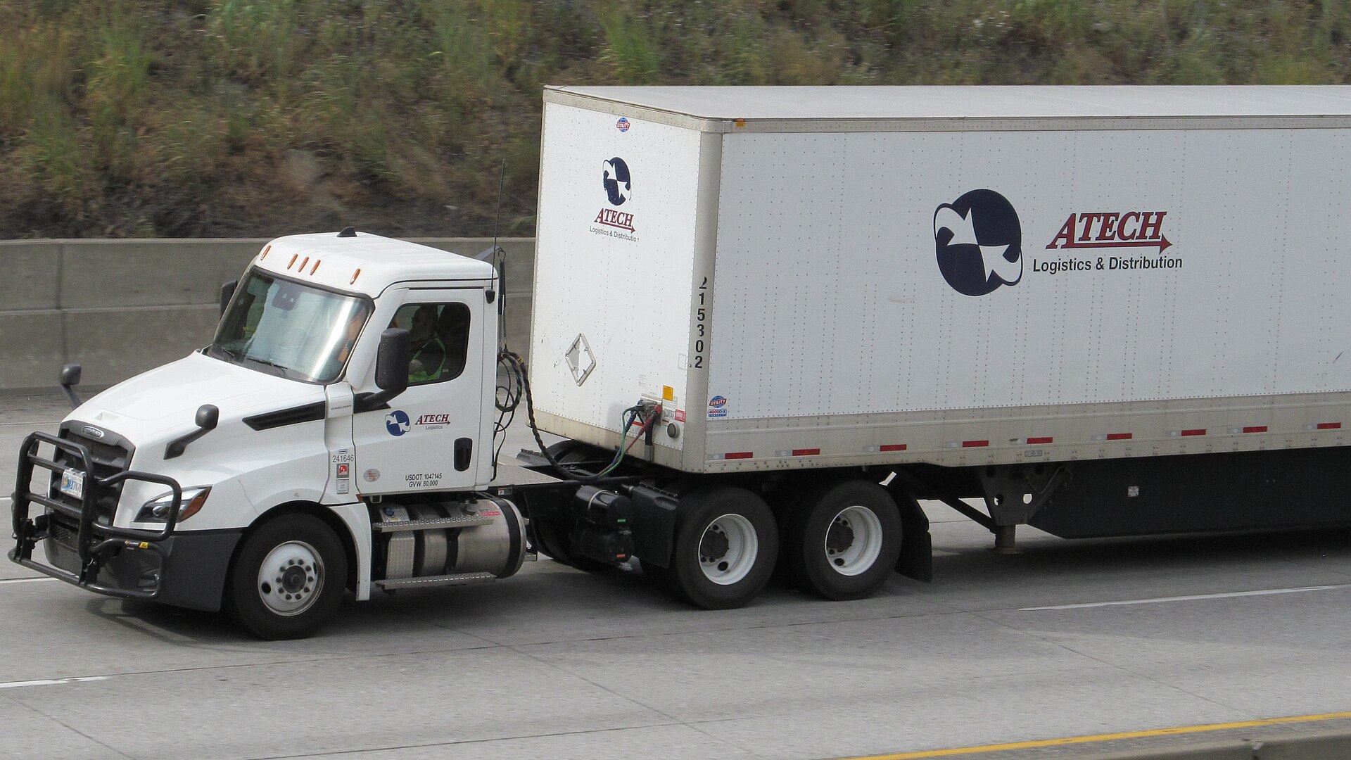 FBI agents investigating financial fraud at a freight brokerage office