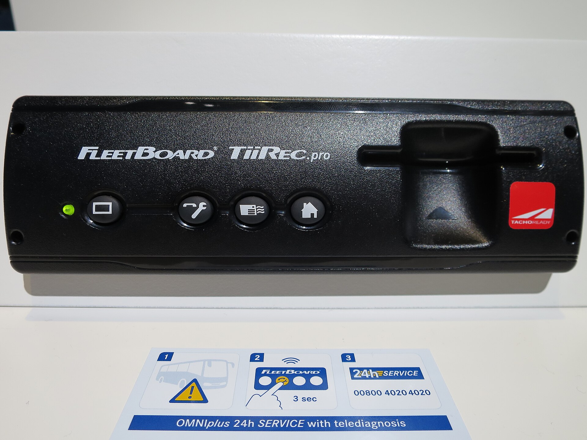 Progressive Commercial insurance application screen showing telematics device requirement for trucking fleet