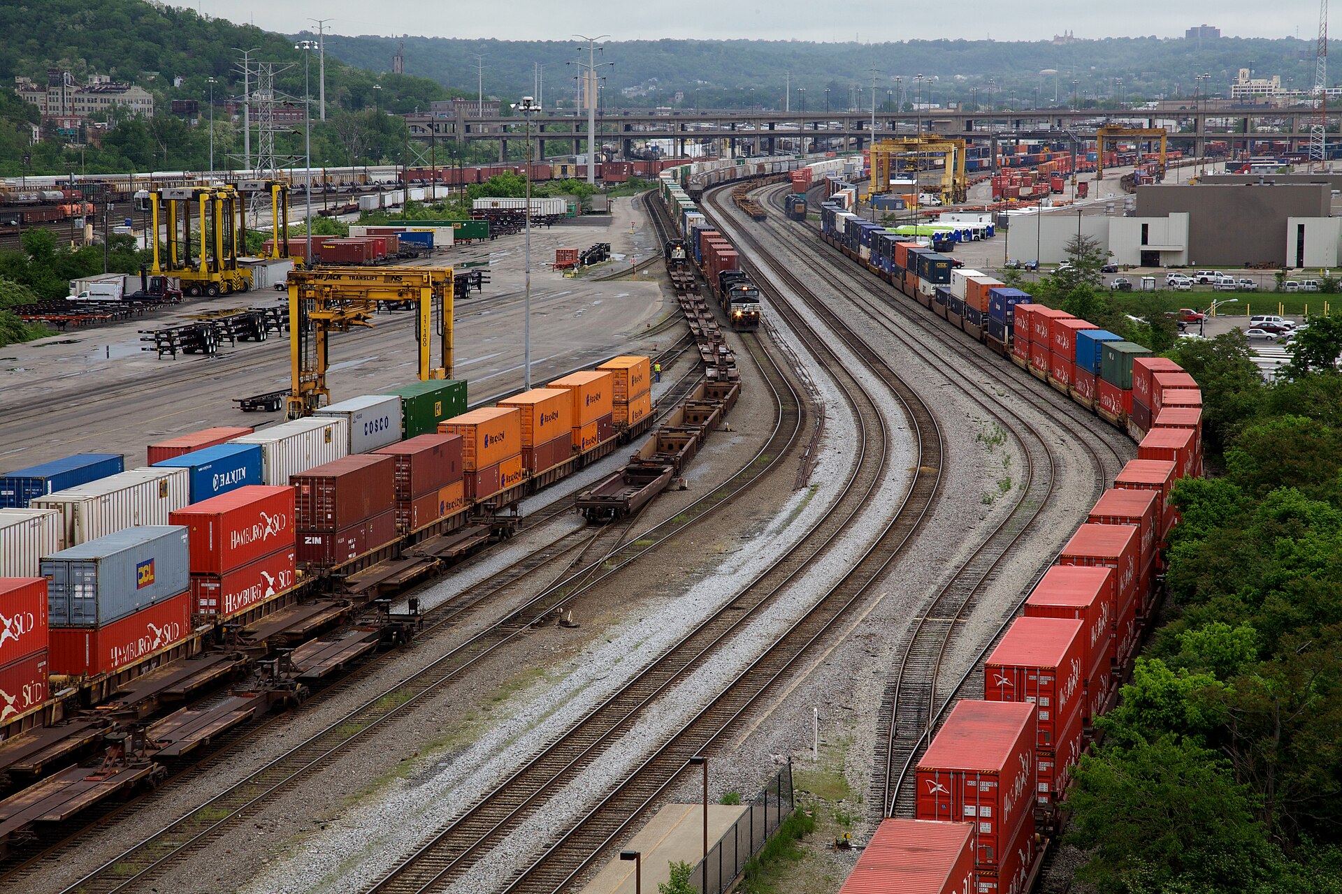 Intermodal containers stacked at rail terminal yard