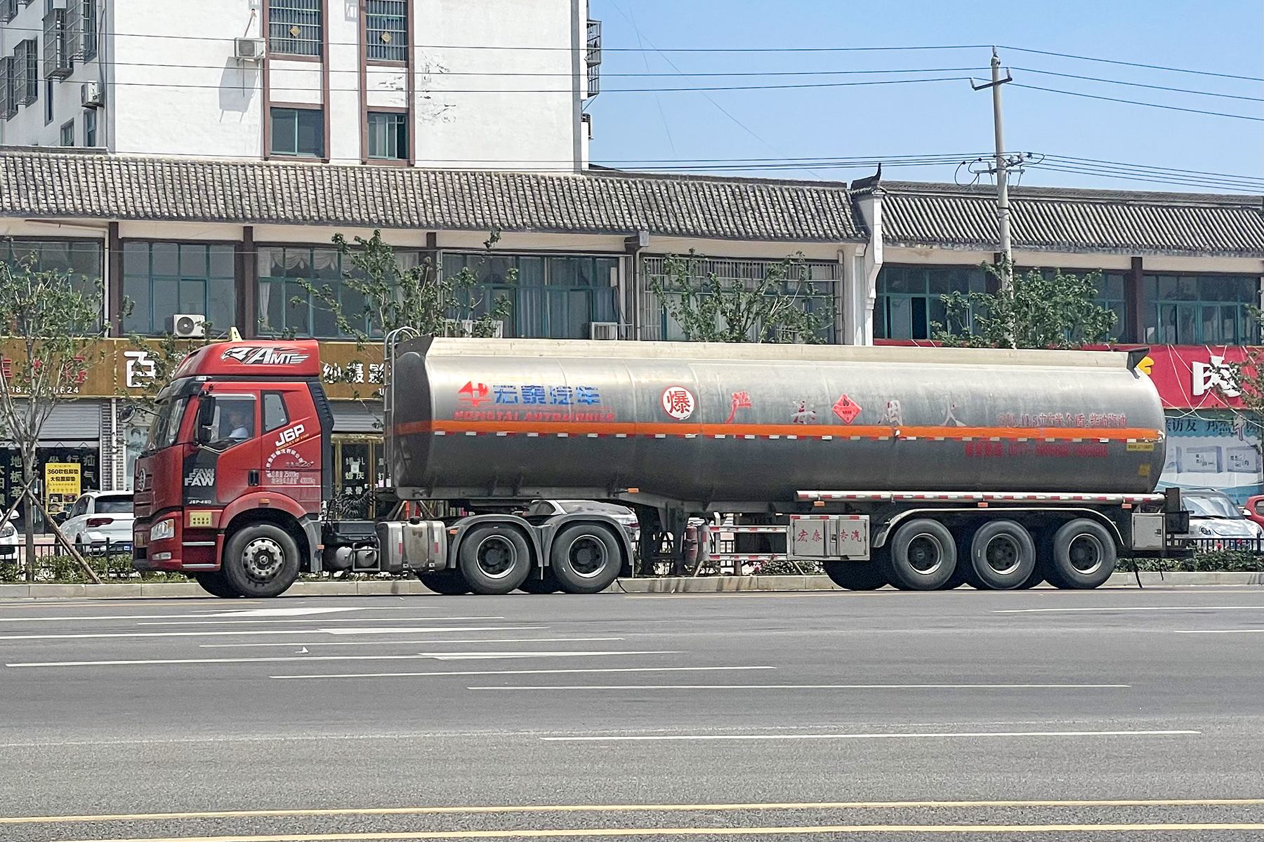 Tank truck hauling bulk liquid on highway, representing specialized equipment challenges facing NTTC fleets under new chairman Jeremy Mairs