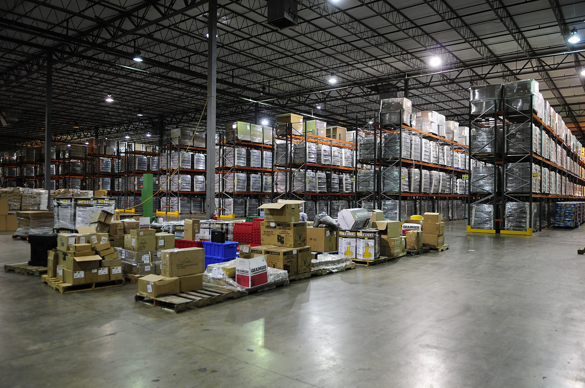 Cases of bourbon stacked in warehouse awaiting pickup by freight carrier