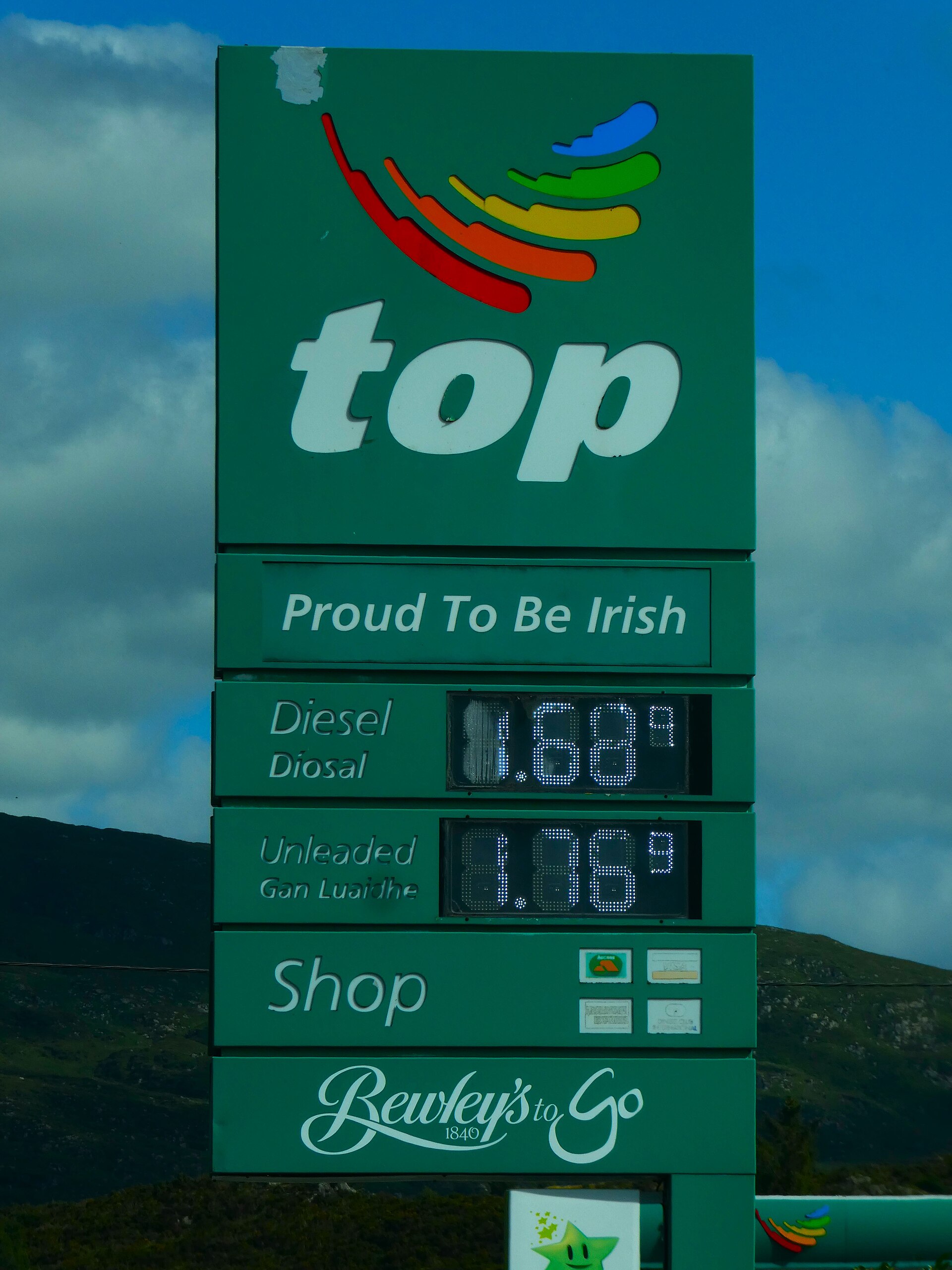 Diesel fuel pump nozzle at truck stop showing price per gallon display