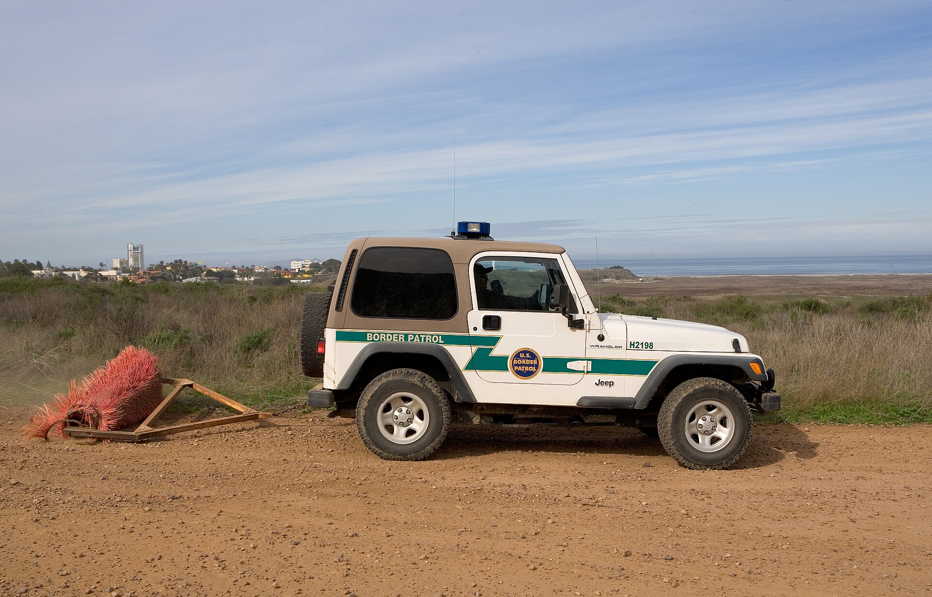 Tractor-trailer crossing US-Mexico border at commercial port of entry