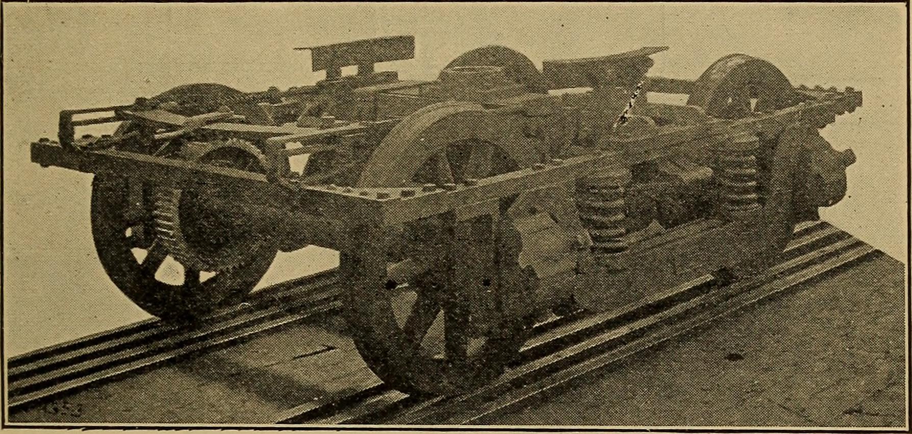 Class 8 tractor cab showing forward-facing ADAS camera and radar sensor mounted behind windshield