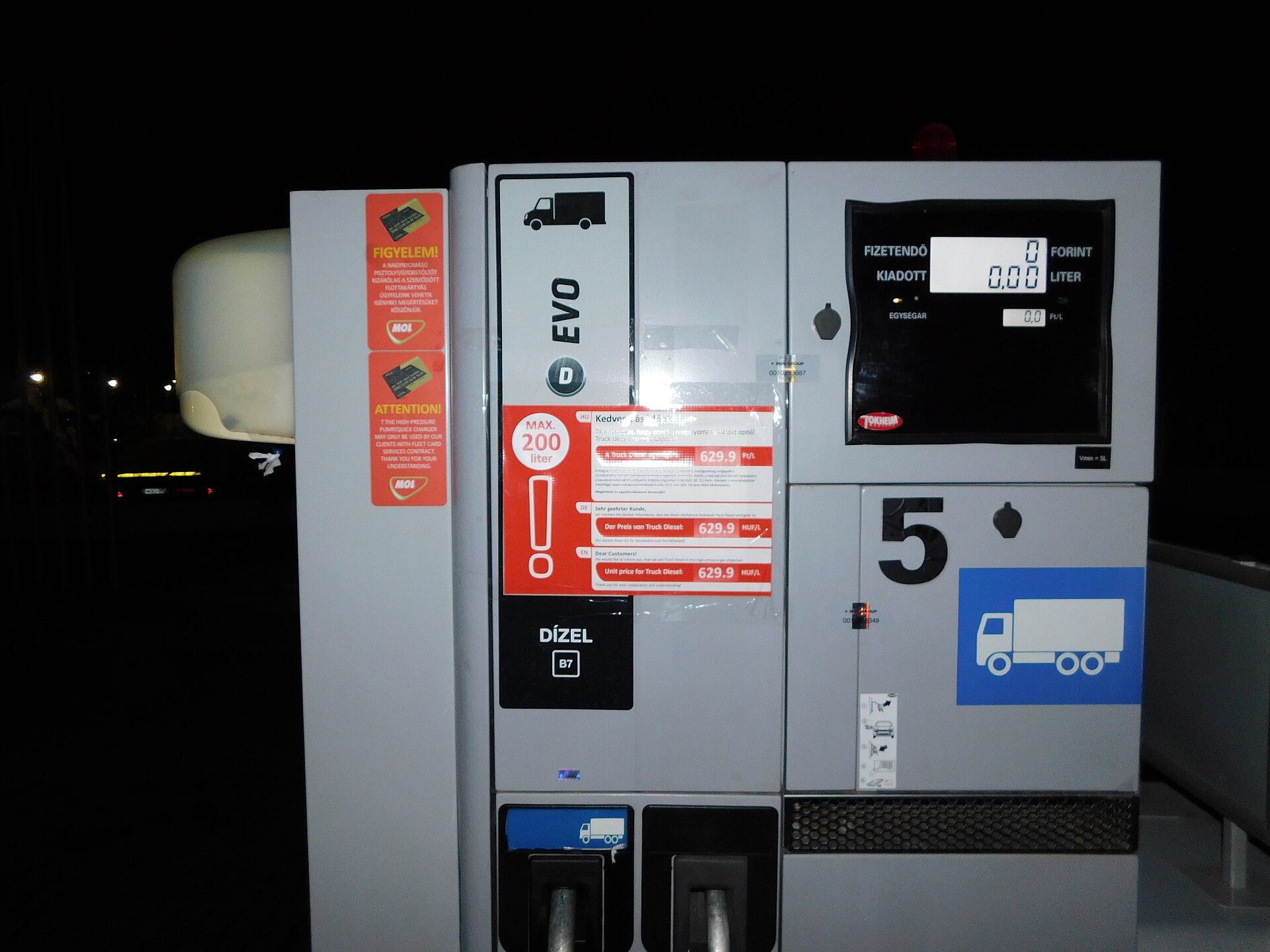 Fuel pump nozzle in truck tank as diesel prices climb with inflation