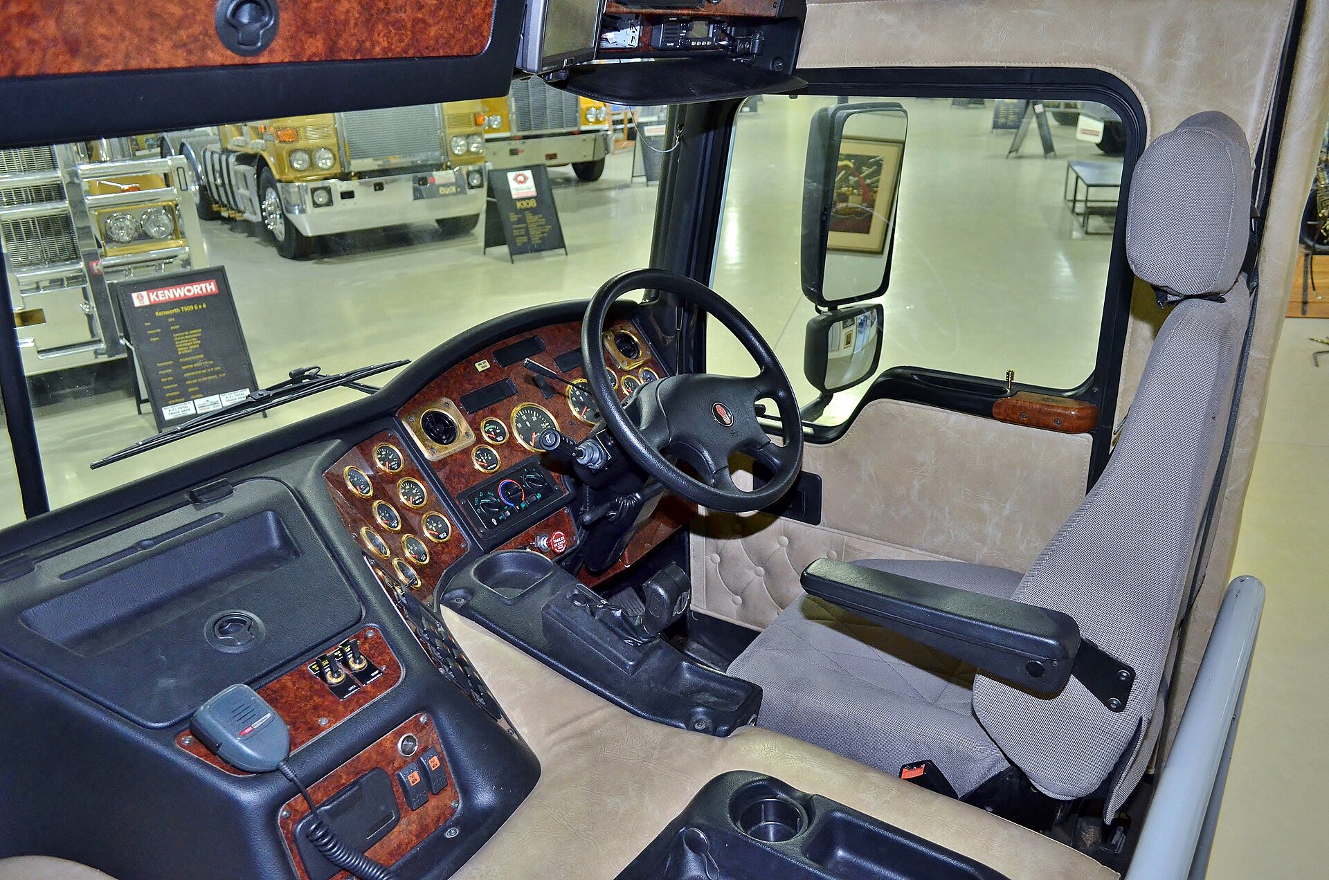 Autonomous truck on highway with Aurora Driver technology system visible on cab exterior
