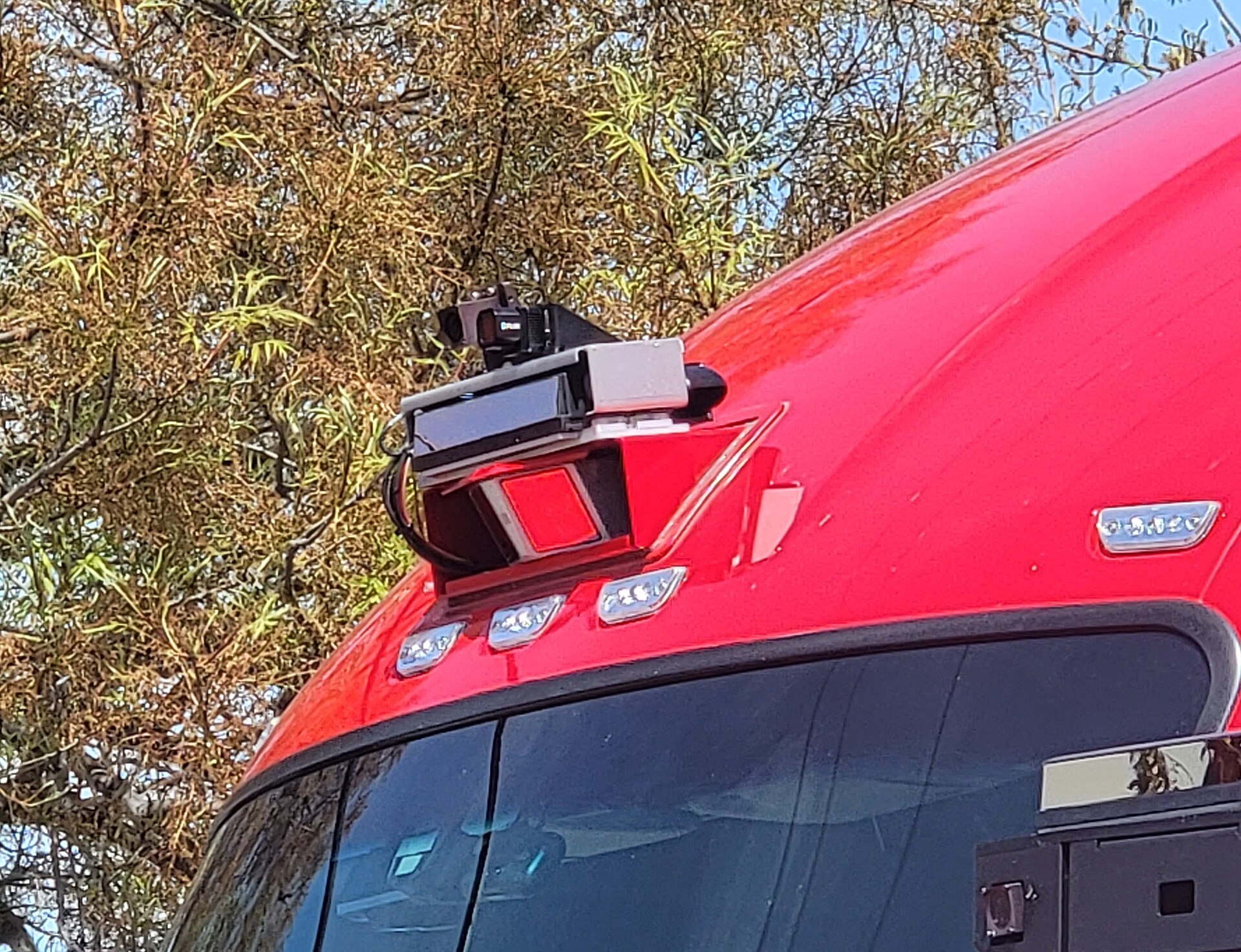 Waabi-powered Volvo VNL Autonomous tractor on display at Advanced Clean Transportation Expo in Las Vegas showing exterior sensor array