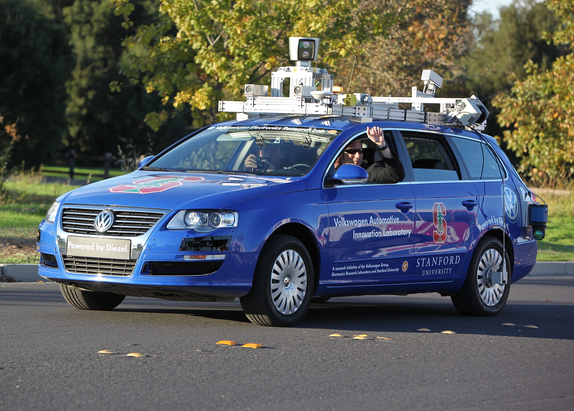 Class 8 tractor on highway equipped with autonomous driving sensors and lidar array