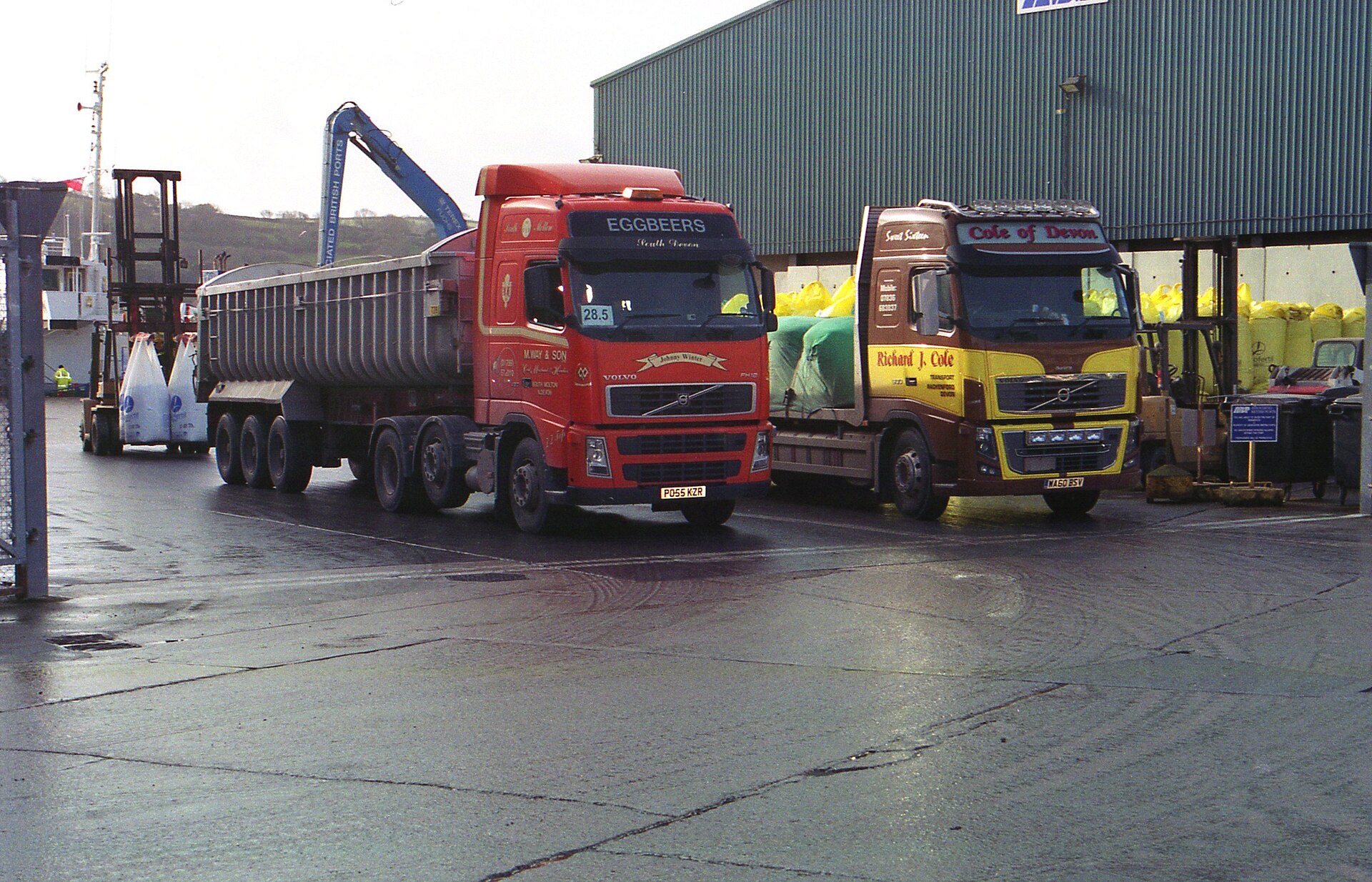 Heavy-haul truck transporting over-dimensional equipment on a multi-axle lowboy trailer