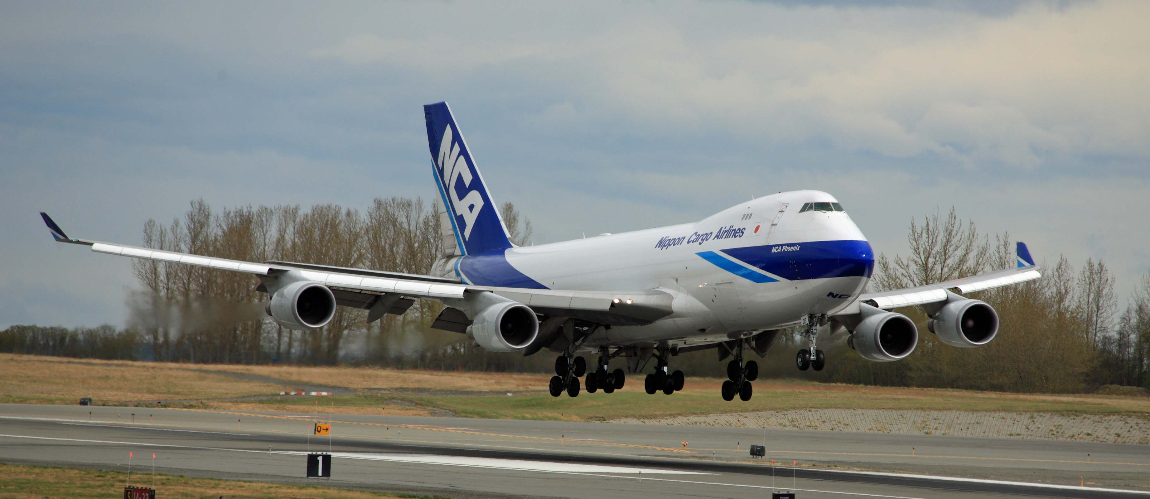 Boeing 747 freighter aircraft on tarmac preparing for cargo operations