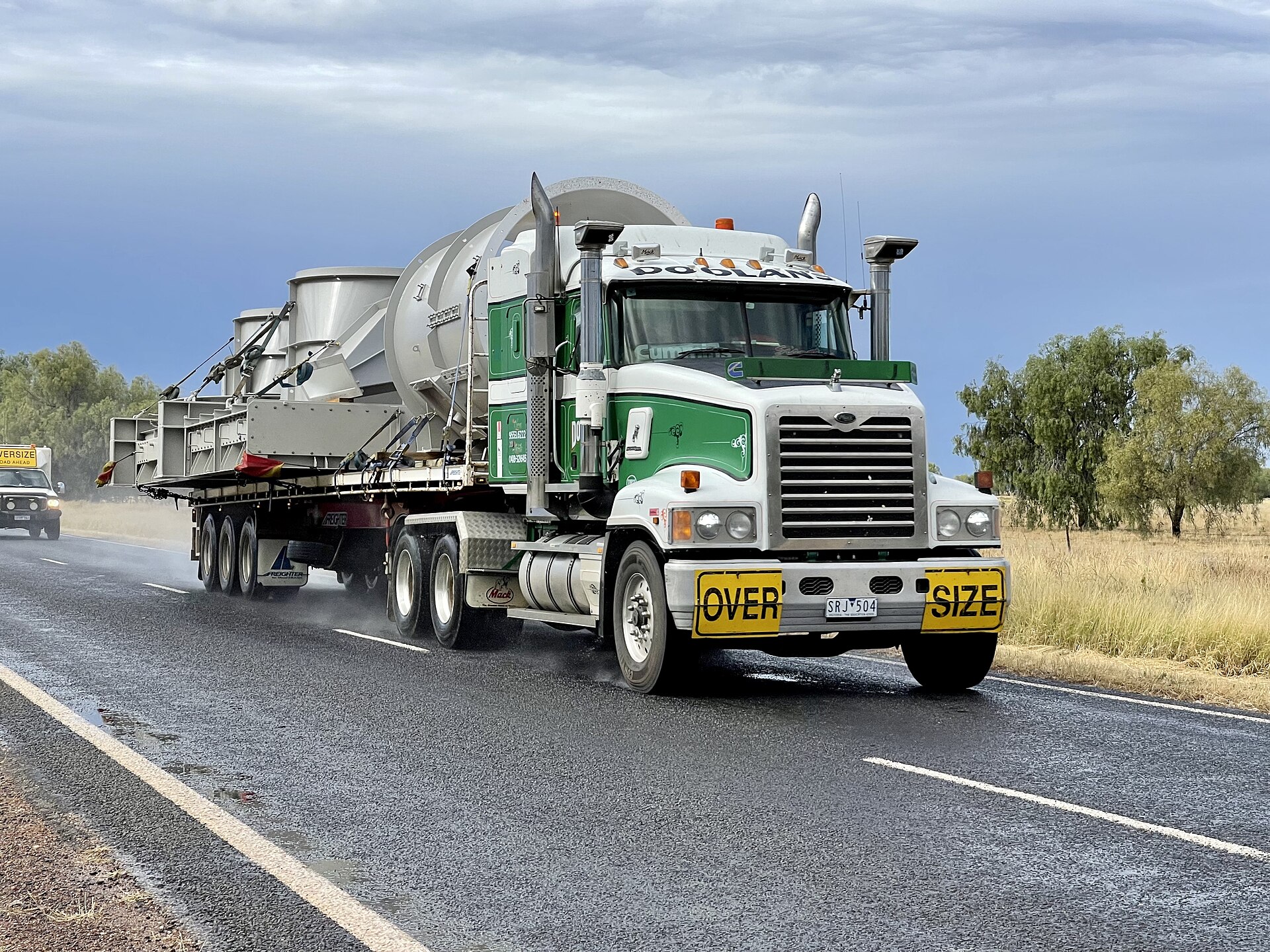 Freight truck on highway representing rising contract and spot rates in truckload market