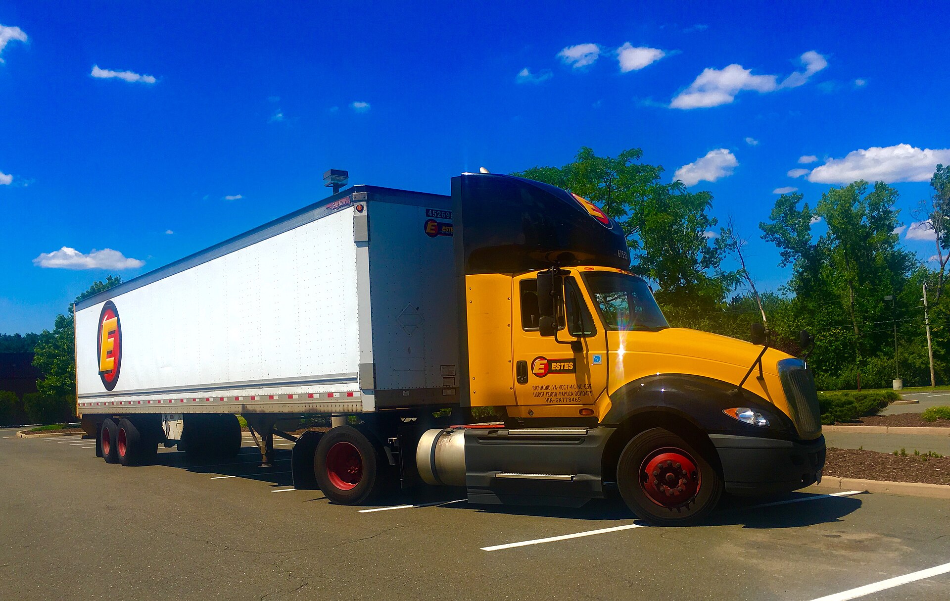 Used semi-truck lot with multiple Class 8 tractors parked in rows, representing March 2026 sales volume and inventory levels.