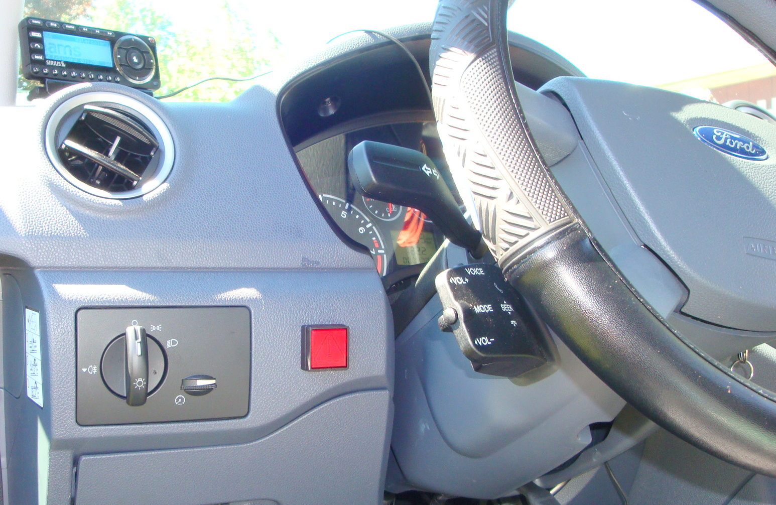 Dashboard camera mounted on commercial truck windshield recording forward view of highway