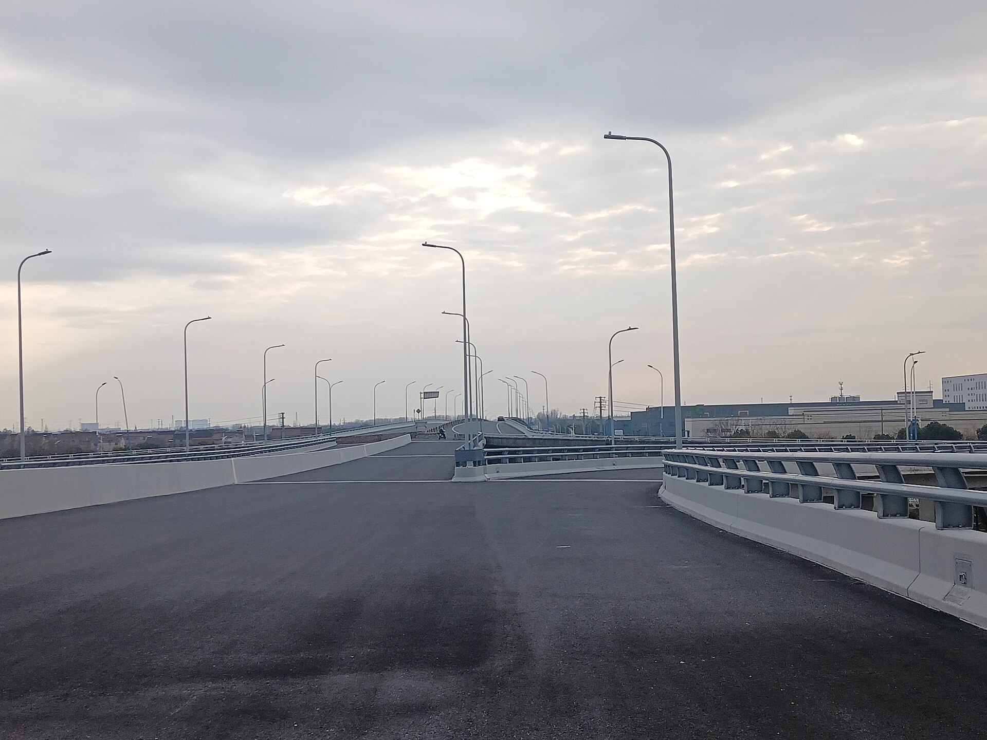 Highway interchange with multiple truck lanes and bridge overpasses under construction