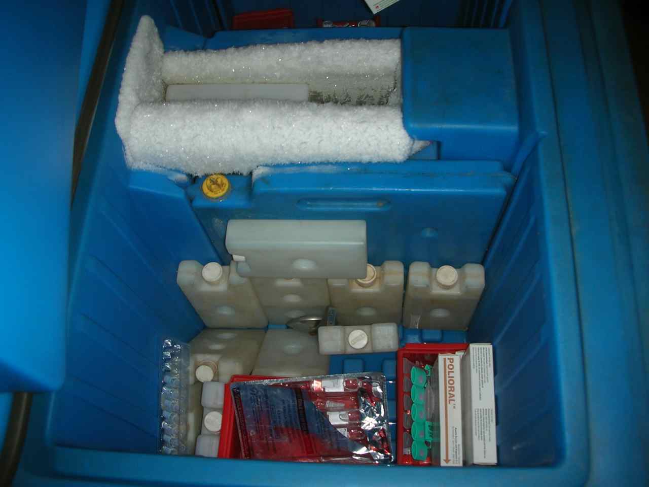 Large refrigerated warehouse facility with multiple loading docks for cold-chain logistics operations