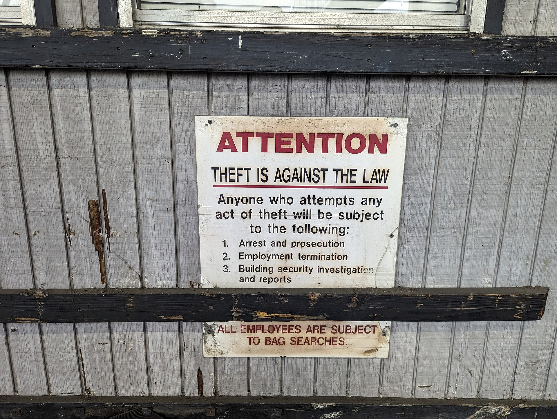 Tractor-trailer parked at commercial warehouse loading dock in Delaware
