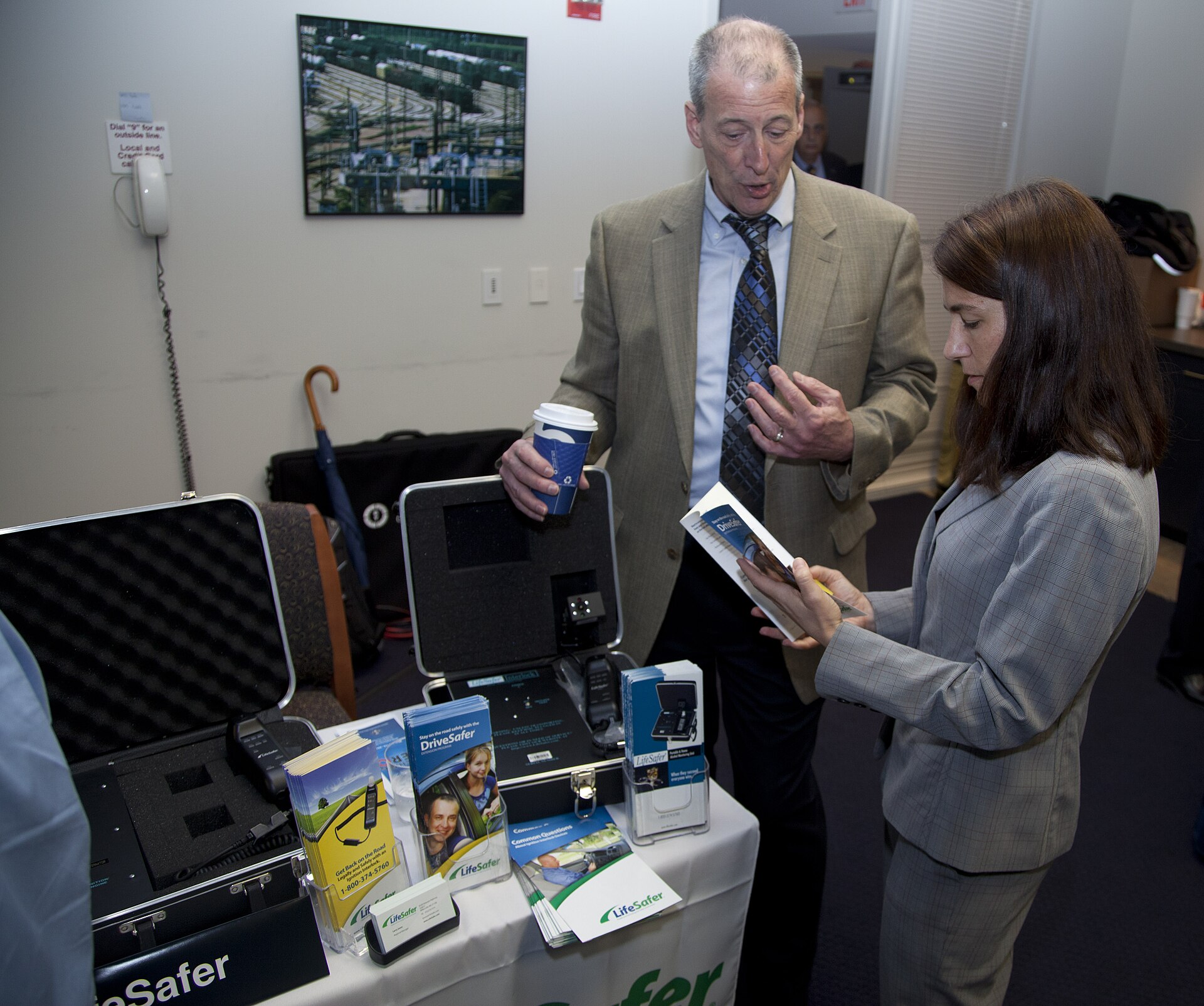 Laboratory technician handling drug test specimen collection materials