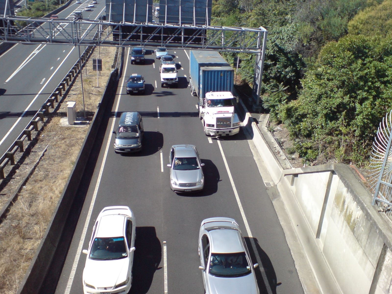 Freight truck on highway representing spot rate increases and tight capacity in truckload market