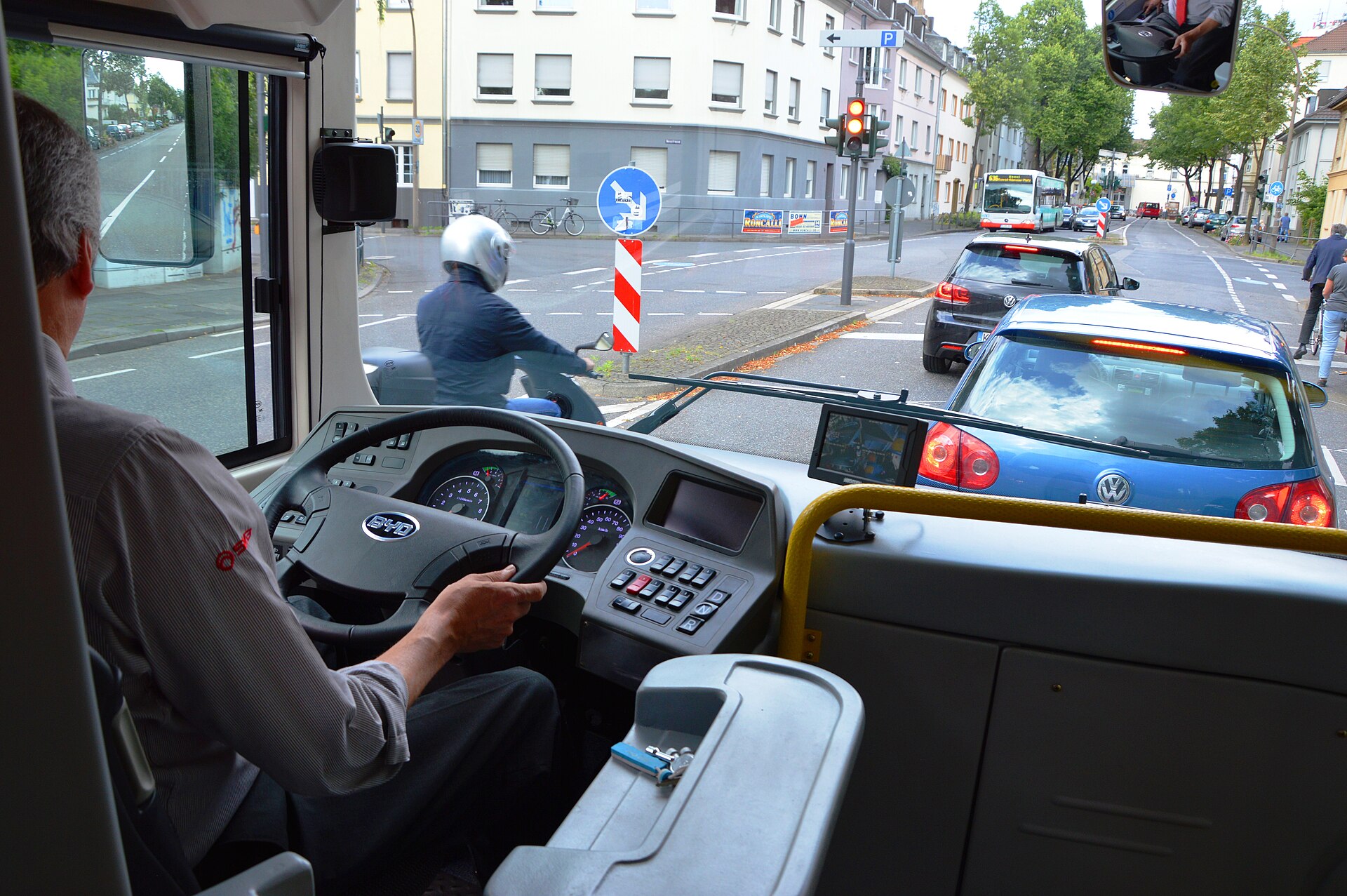 Commercial truck driver undergoing roadside drug screening test with law enforcement officer
