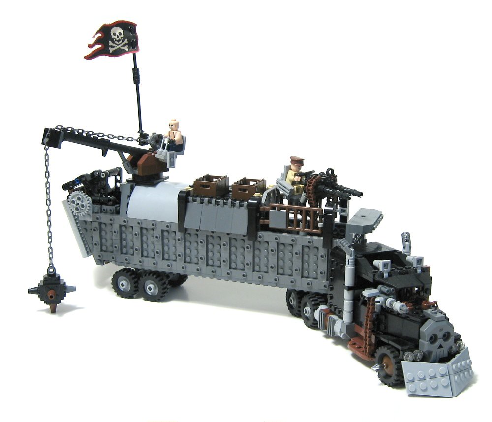 Heavy-haul truck transporting over-dimensional equipment on a multi-axle lowboy trailer