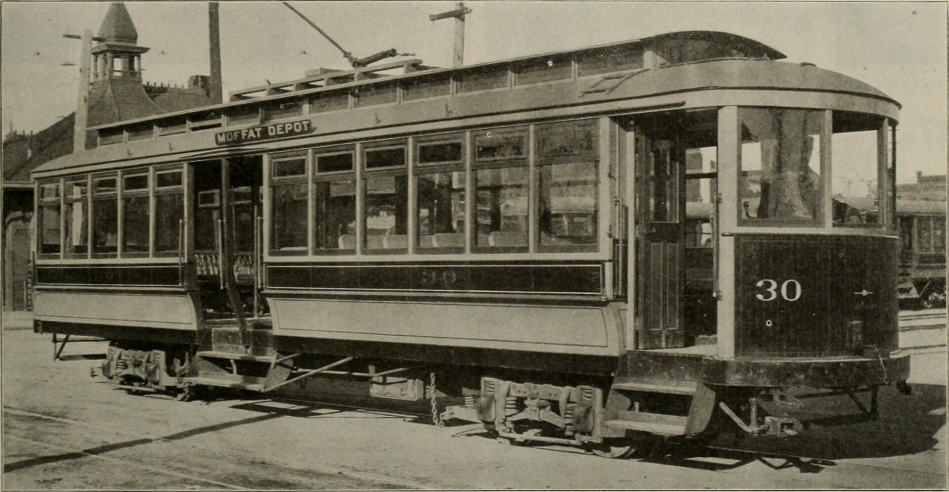 Electric Class 8 drayage tractor charging at port terminal depot