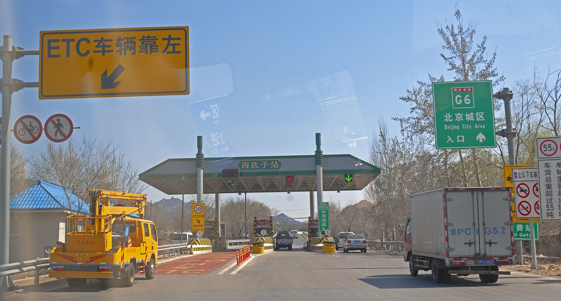 PrePass toll transponder mounted on commercial truck windshield