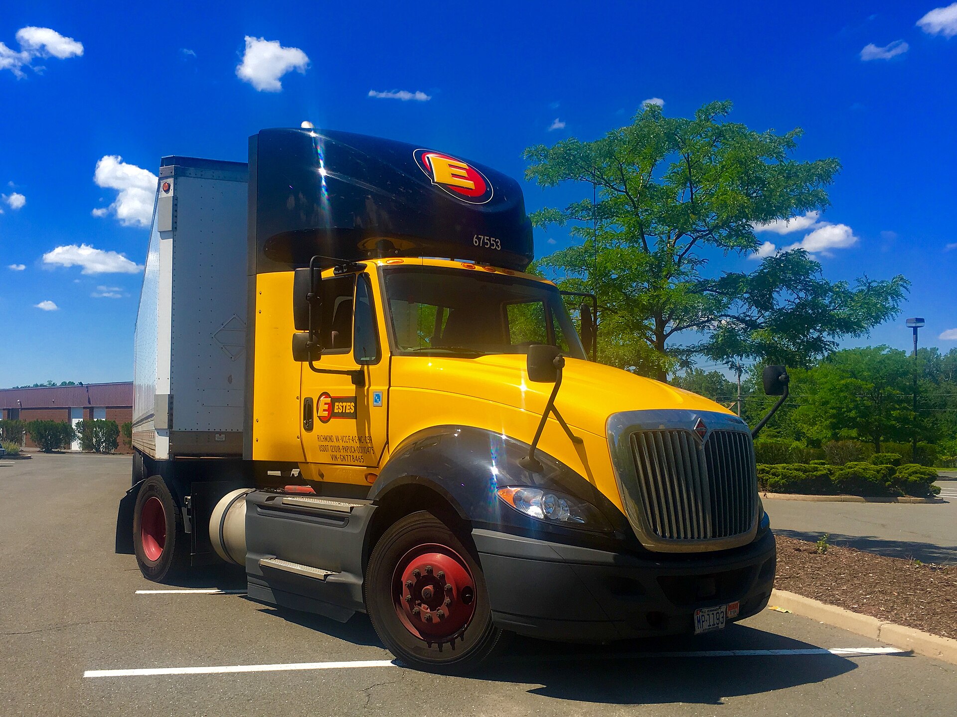 Ryder used truck lot with Class 8 tractors lined up for retail sale