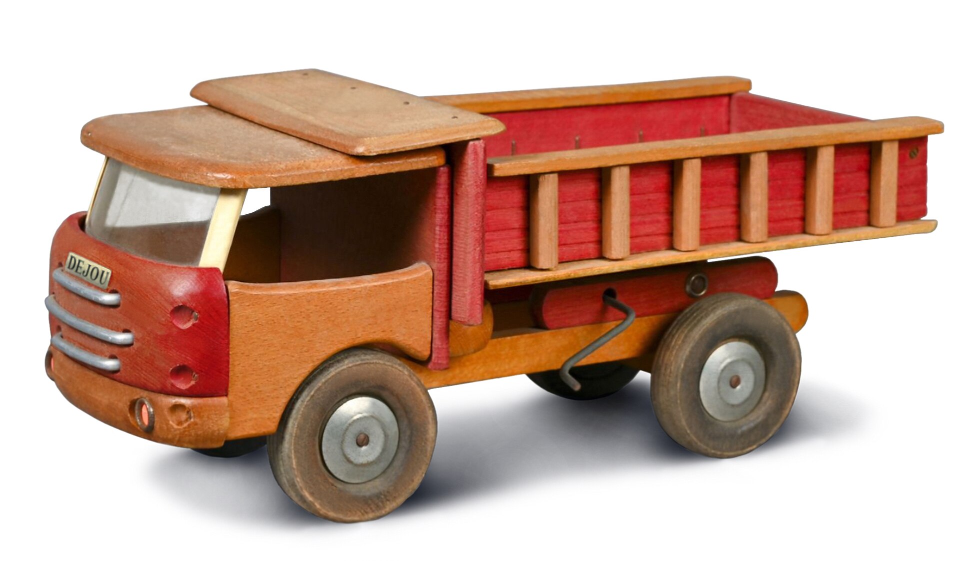 Semi-truck cab with driver visible through windshield on highway, representing truck transportation employment growth