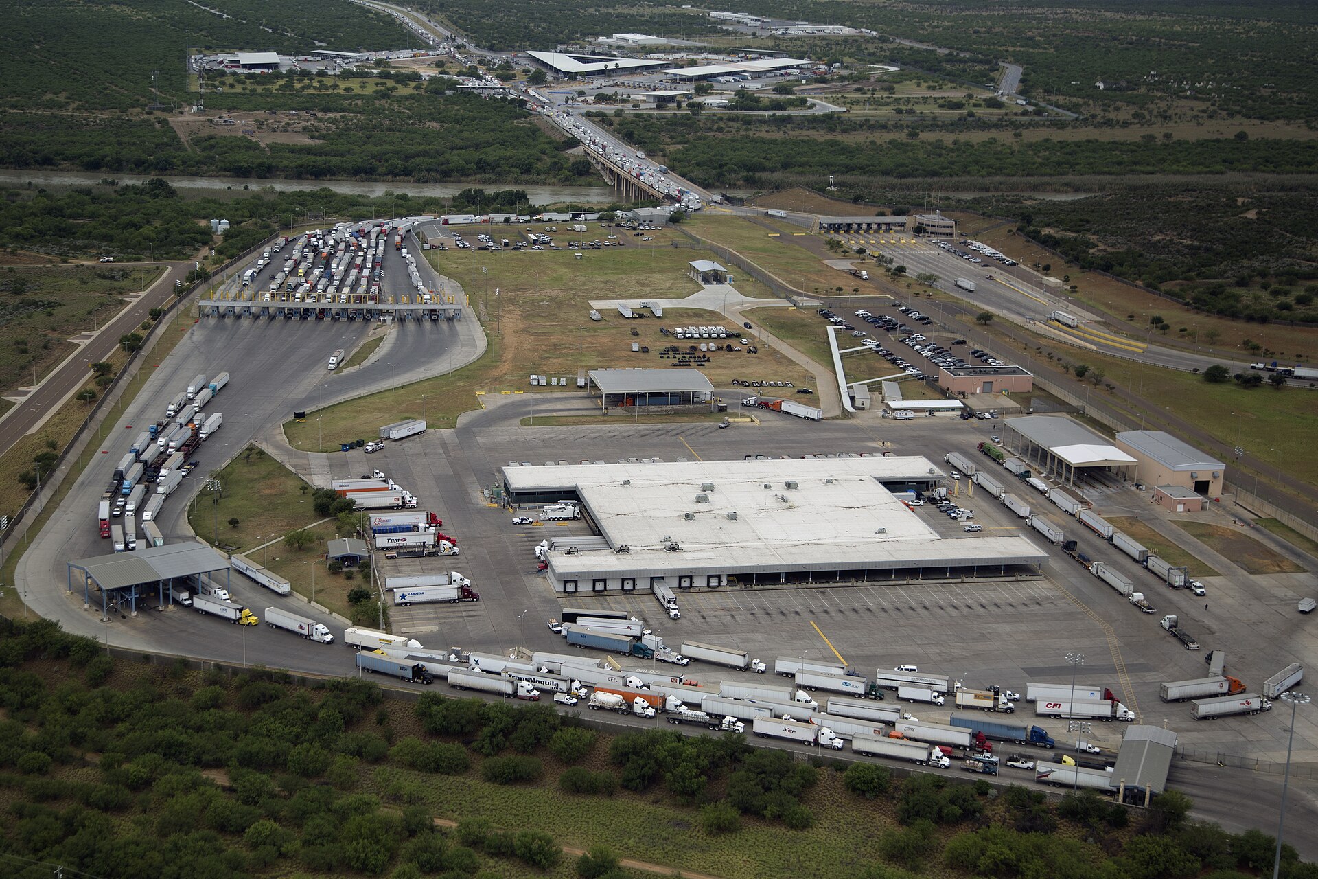 Semi-truck crossing U.S.-Mexico border at commercial port of entry