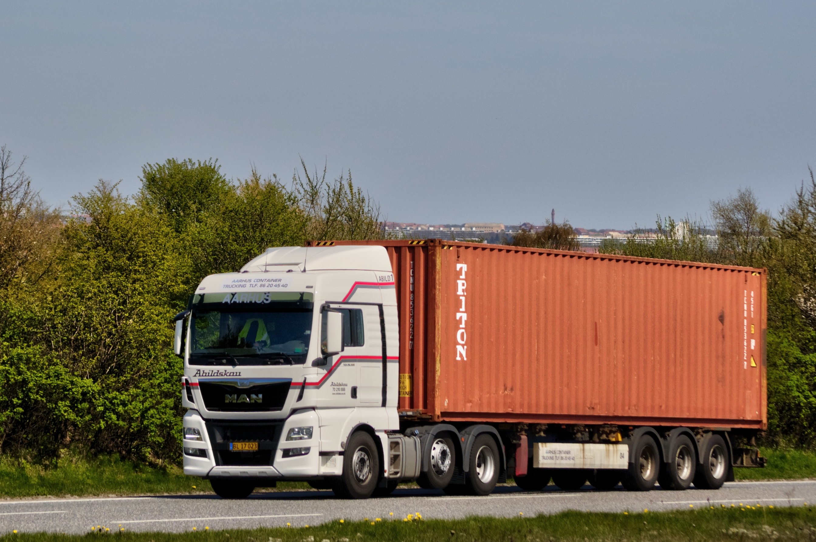 Used Class 8 semi-truck on dealer lot with for-sale signage