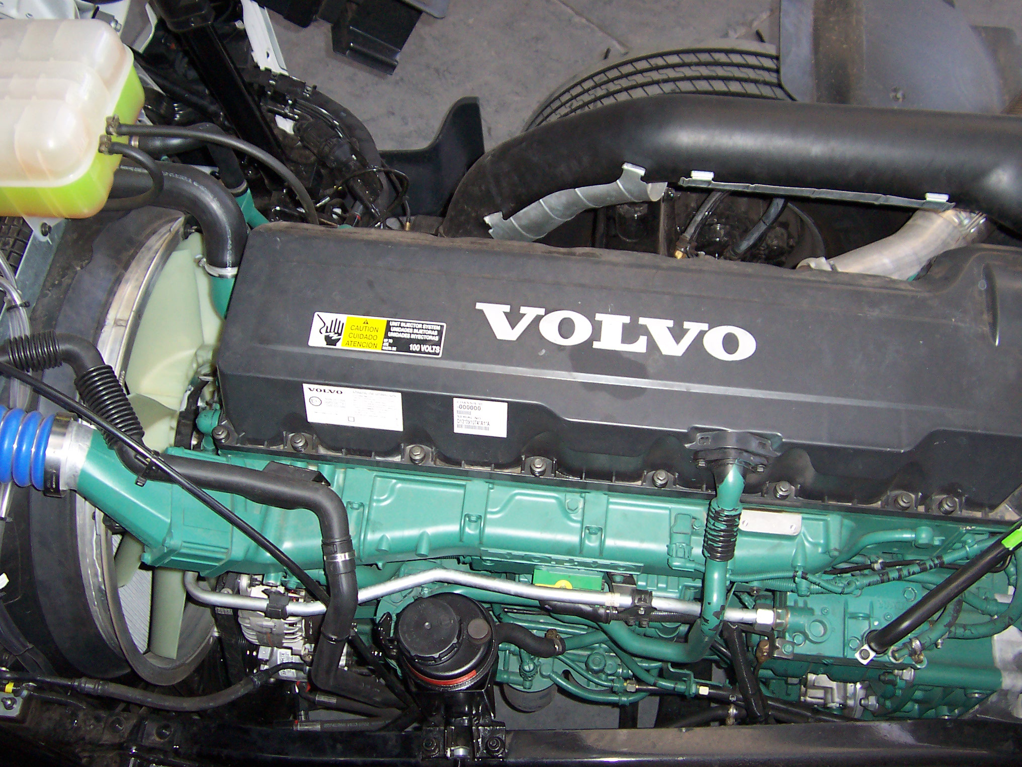 Volvo D13 heavy-duty diesel engine cutaway showing internal components and aftertreatment system